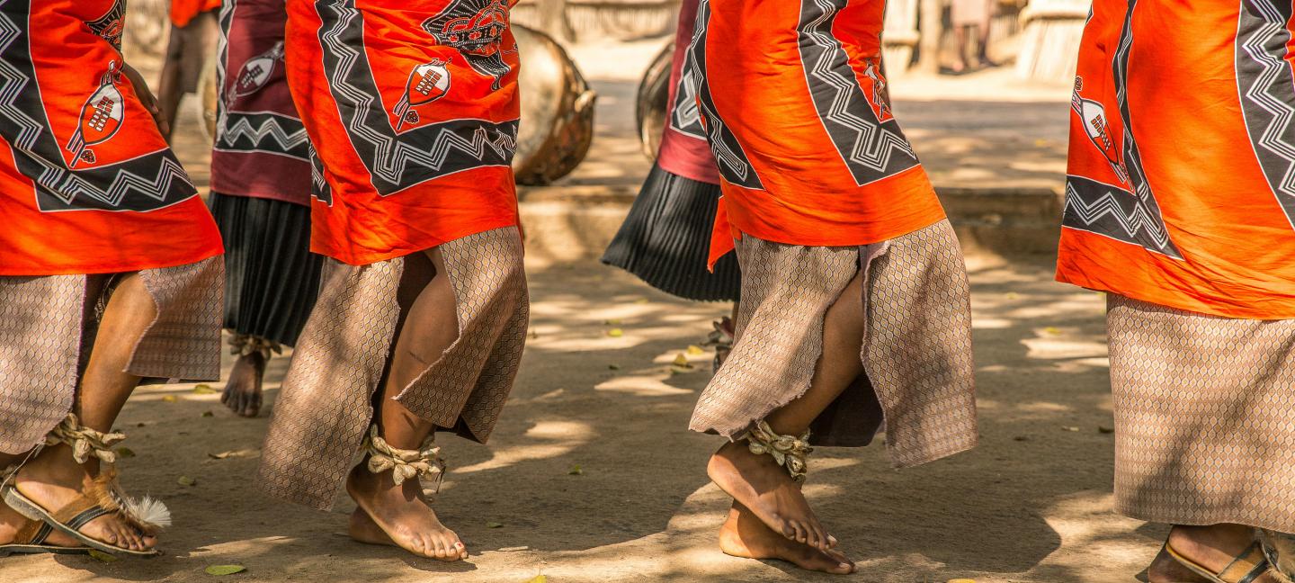 Barefoot Legs of African Women Dancing Ceremonial Dance
